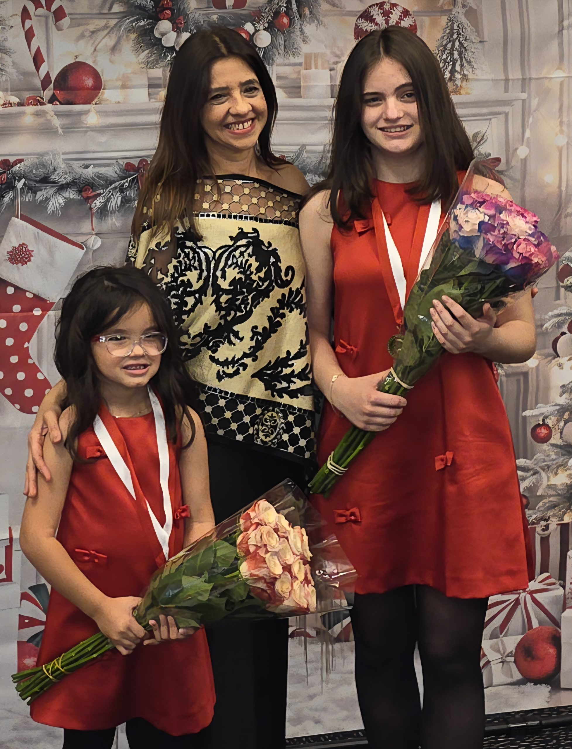 Professor Noilarthy Pino with 2 students